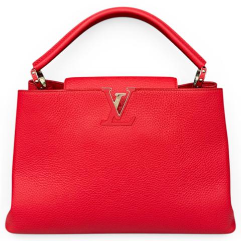 Capucines pony-style calfskin handbag
