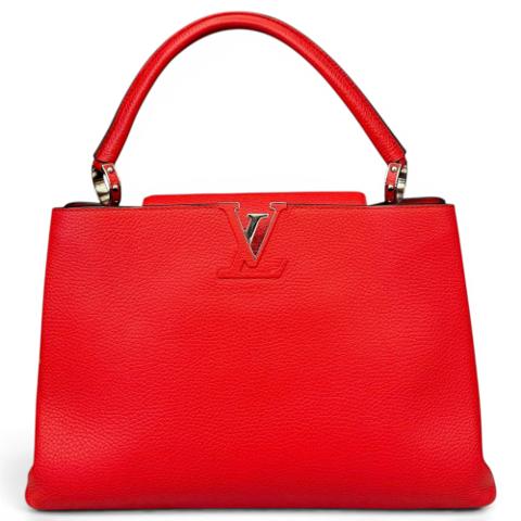 Capucines pony-style calfskin handbag