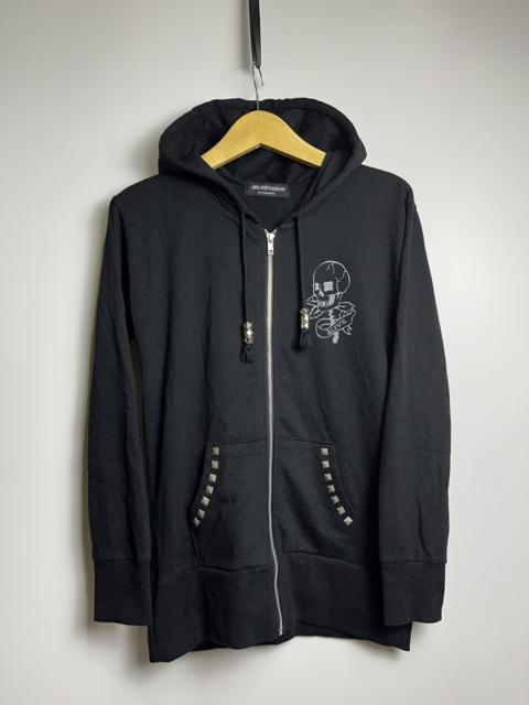Glad News Studded Bone Skull head