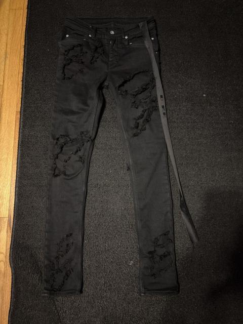 Slashed Tyrone cut denim