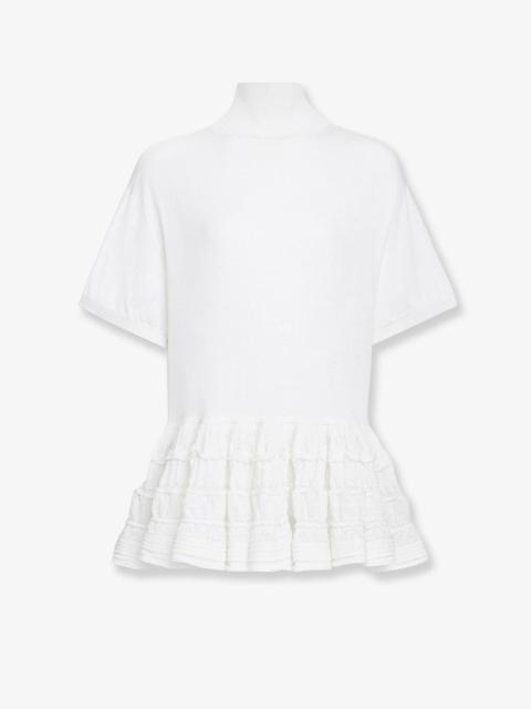 Alaia Peplum virgin wool sweater (FR 40)