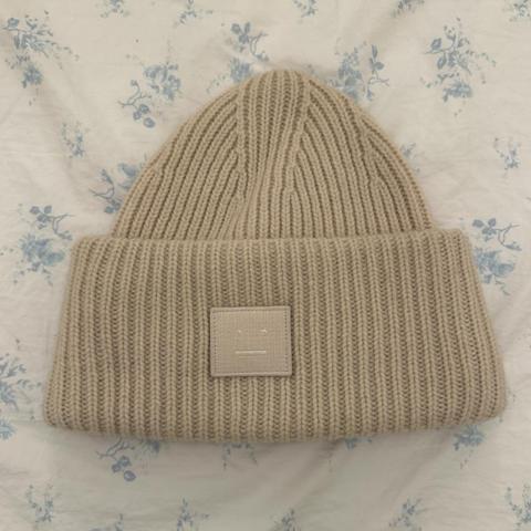 acne studios small face logo
