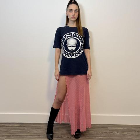 1995 Rare Xuly Bët baby head t-shirt 

Vintage up-cycling high fashion brand by designer Lamine Kouyaté. Dark navy blue form fitting shirt or mini dress featuring a white front and back print with exposed orange seams. Visible “FUNKIN’ FASHION” red tag near the hem. Text in the back that  says “free for fever”. The baby head is from the album cover of FFF (Fédéreration Française de Fonck) which appeared in the brand's Spring 1995 collection.  

- Stretchy fabric
- In excellent vintage condition 

Size : Marked “One size”

Measurements taken flat :
Chest 21" / Length 27"

Modeled on a size S, 5ft8"
DM for shipping outside US/CAD or if you have any questions 🛍️

#xulybet #grunge #upcycle #patchwork #nichedesigner