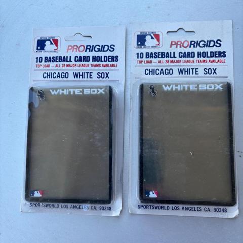 Vintage ProRigids Chicago White Sox Baseball Card Holders 2 Packs 20 Total MLB

Vintage ProRigids Chicago White Sox top-load baseball card holders come in a lot of two factory-sealed packs, totaling 20 individual holders. These officially licensed MLB collectibles feature the classic White Sox logo and text on a sleek black-bordered design. Manufactured by Sportsworld in Los Angeles, these vintage supplies are perfect for protecting standard-sized trading cards while showcasing team pride. The packaging shows some light shelf wear consistent with age, but the contents remain untouched and ready for use.

Brand: ProRigids
Team: Chicago White Sox
League: MLB
Quantity: 2 Packs (20 Holders Total)
Type: Top Load Card Holders
Color: Black/Clear
Material: Rigid Plastic
Manufacturer: Sportsworld
Origin: Made in Taiwan
Year: Vintage
Officially Licensed: Yes
Pack Count: 10 per pack

Keywords: South Side, MLB Memorabilia, Trading Card Protection, Vintage Sports Supplies, Baseball

#Vintage #Retro