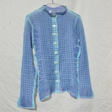 Yoshiki Hishinuma blue mesh button-up blouse with slightly belled sleeves. 
Item is in good condition with no visible defects. Would best fit a size 6-8. May also fit a small size 10

blue mesh, button-up, belled sleeves, lightweight, sheer fabric, casual chic, streetwear, airy blouse, pastel blue, trendy