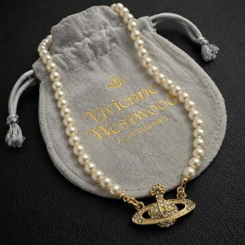 Vivienne Westwood Gold Pearl Bas Relief Choker Necklace
40 cm

#viviennewestwood #necklace #choker #gold #jewelry