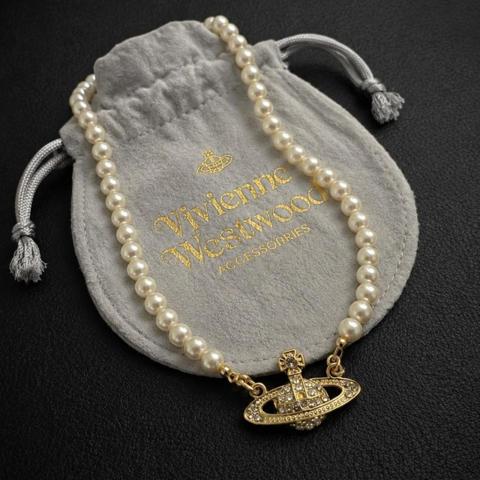 Vivienne Westwood Gold Pearl Bas Relief Choker Necklace
40 cm

#viviennewestwood #necklace #choker #gold #jewelry