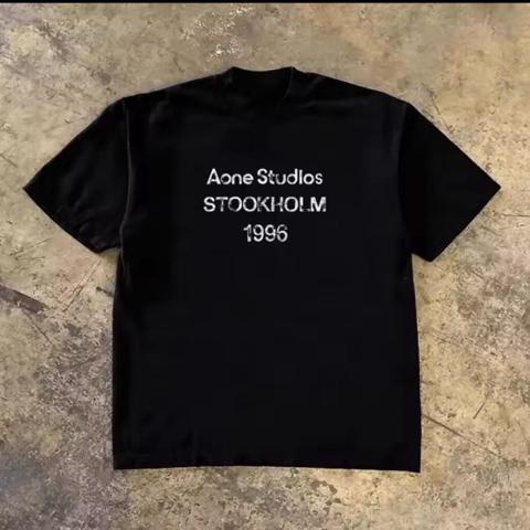 Acne Studios Stockholm 1996 black t-shirt with white text reading 'Aone Studios', 'STOCKHOLM', and '1996' #stockholm