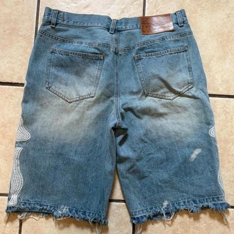 blue skeleton jorts