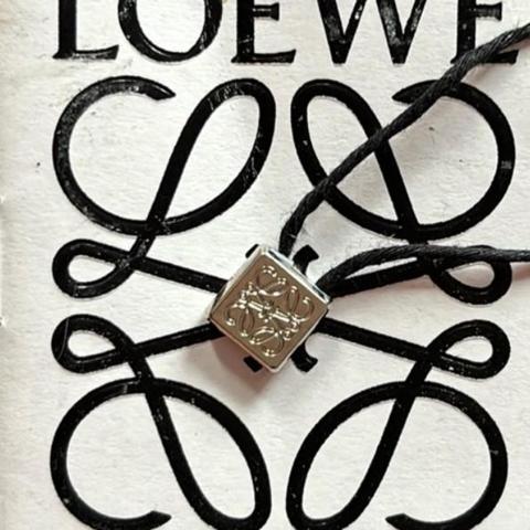 Loewe silver charm with black cord size OS #luxury #designer