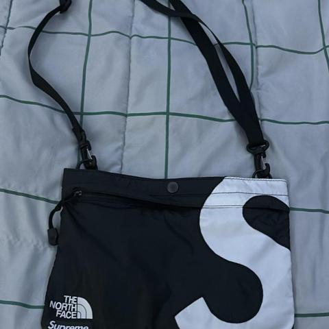 north face x supreme bag