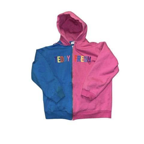 Teddy Fresh Adult XL Full Zip Blue Pink Hoodie Sweatshirt Jacket Streetwear

Upgrade your casual wardrobe with this stylish Teddy Fresh Adult XL Full Zip Blue Pink Hoodie Sweatshirt Jacket. The hoodie is perfect for men who love to showcase their unique fashion sense. It features a full zip design, making it easy to wear and take off. The blue and pink colors are eye-catching and will definitely turn heads.

The hoodie is made of high-quality materials and is perfect for everyday use. It is comfortable to wear and will keep you warm on chilly days. The size is perfect for regular size types and the hoodie is available in size L. This hoodie is perfect for streetwear and can be paired with any type of clothing. Don't miss out on this Teddy Fresh Adult XL Full Zip Blue Pink Hoodie Sweatshirt Jacket and add it to your collection today! Strain on blue sleeve, hardly noticeable- see picture