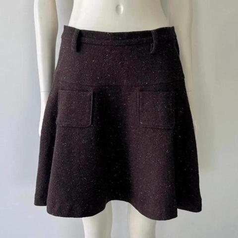 Sunao Kuwahara FW2012 brown wool blend skirt with belt loops and two small front pockets. Side zip with hook and eye closure. Lined. In perfect condition. 
Sunao Kuwahara is a Japanese designer known for his work with Issey Miyake.

Marked size: JP M
Fits like a US S
waist: 30”
length: 19”

90% wool
5% polyester
5% polyurethane

#sunaokuwahara#japan#japanesedesigner#wool#mori