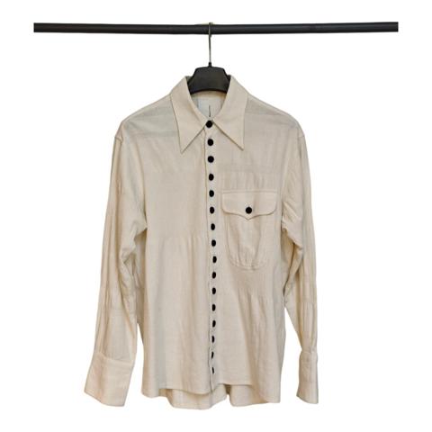 John Alexander Skelton REPLICA Shirt (Antique Cream / L-XL)

Artisanal replica shirt inspired by John Alexander Skelton. Crafted in antique cream/off-white cotton with black flecks, featuring varying weave textures and genuine horn buttons.

Heavy textured cotton with organic slubs and varied weaves.

Authentic horn buttons, pointed oversized collar, and a historical, unlined workwear drape.

Excellent condition 

Fits oversized.

Tags & Keywords
#johnalexanderskelton #artisanal #workwear #archivalfashion #paulharnden