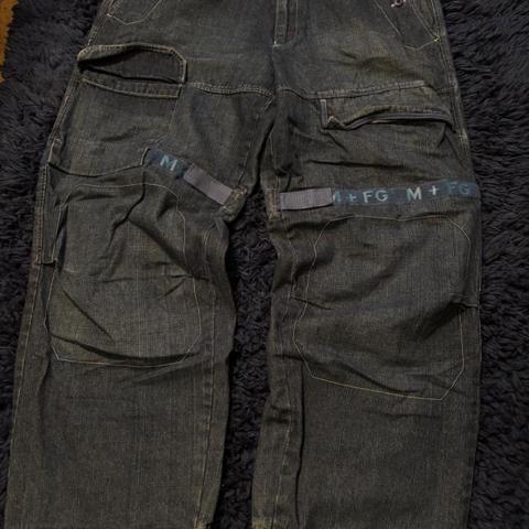 Marithe Francois Girbaud Shuttle Tape
Size 36M 
Good condition apart from the hem as shown.