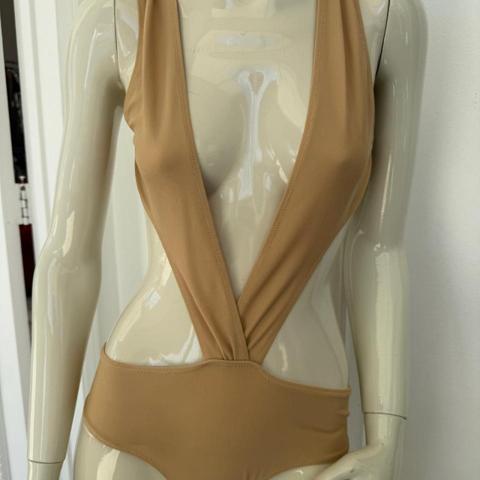Alessandro Dell'Acqua tan one piece swimsuit in a size 40 #swimwear #designer #vintage #chic