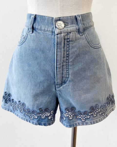 Chanel 2024 denim shorts with floral logo embroidered hem